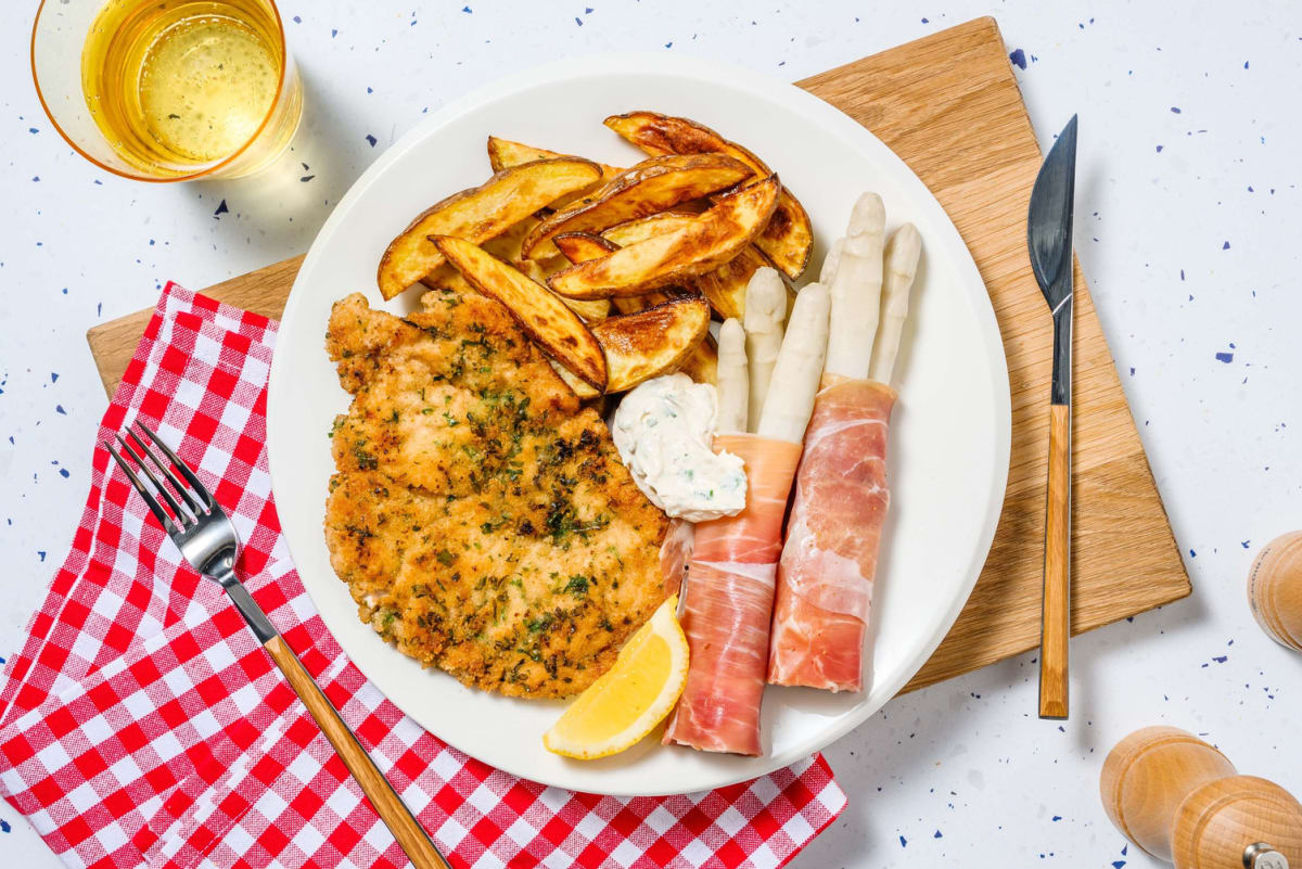 Kräuterschnitzel mit Spargel in Prosciutto