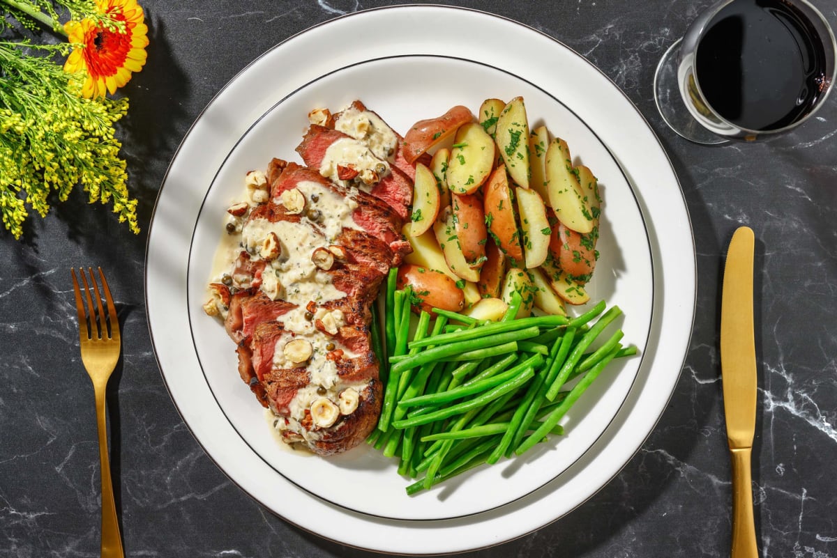Feines Rindersteak mit grünem Pfefferrahm
