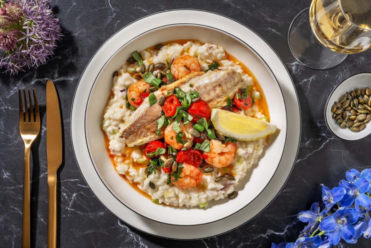 Risotto au fenouil à l'ail avec filet de bar et crevettes