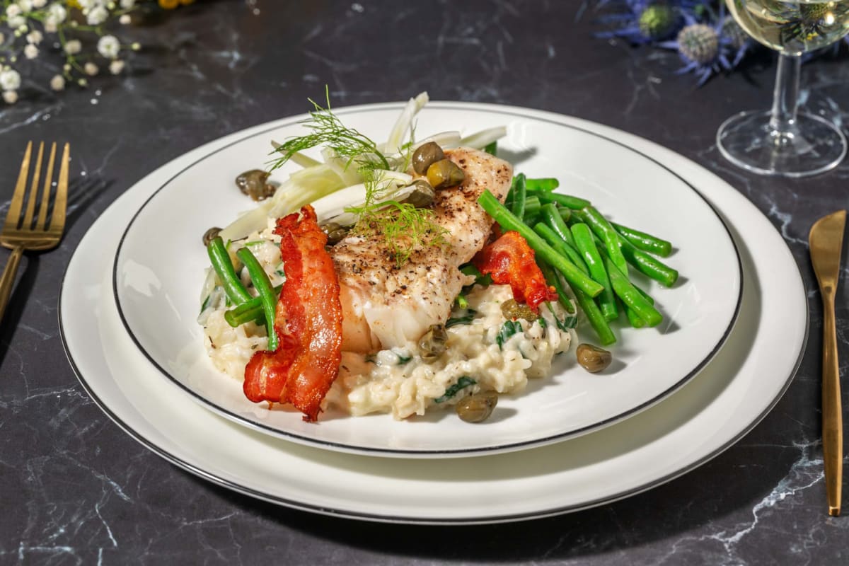 Kabeljauw met knapperig ontbijtspek en romige venkelrisotto