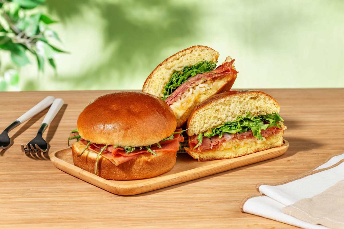 Luxury brioche toast with cheese and prosciutto