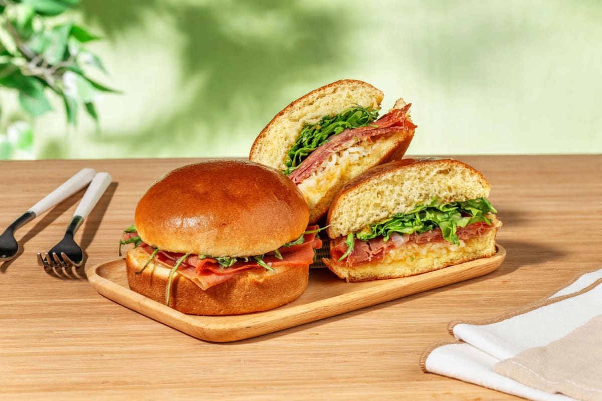 Luxury brioche toast with cheese and prosciutto