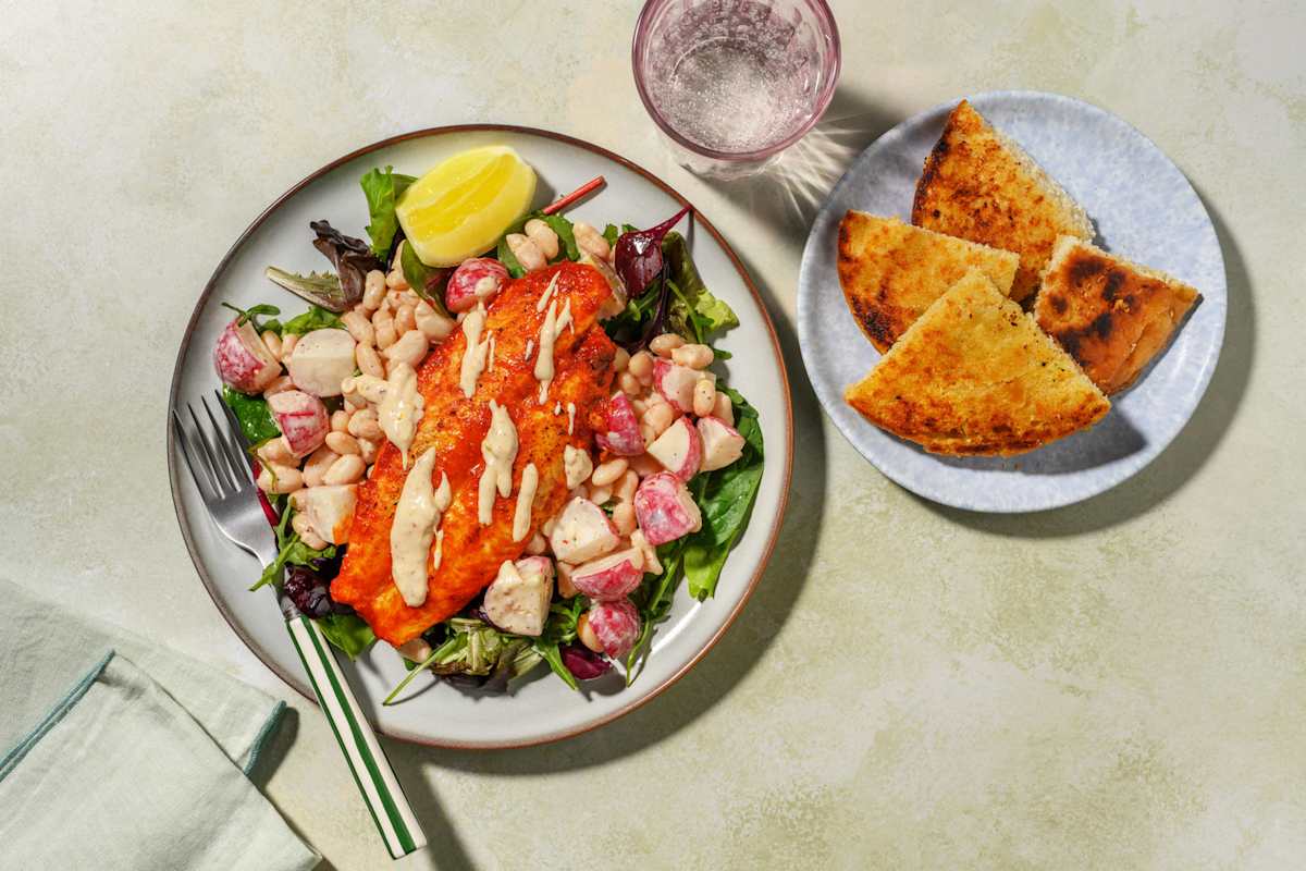 Harissa-Fischfilet mit knusprigem Knoblauchbrot