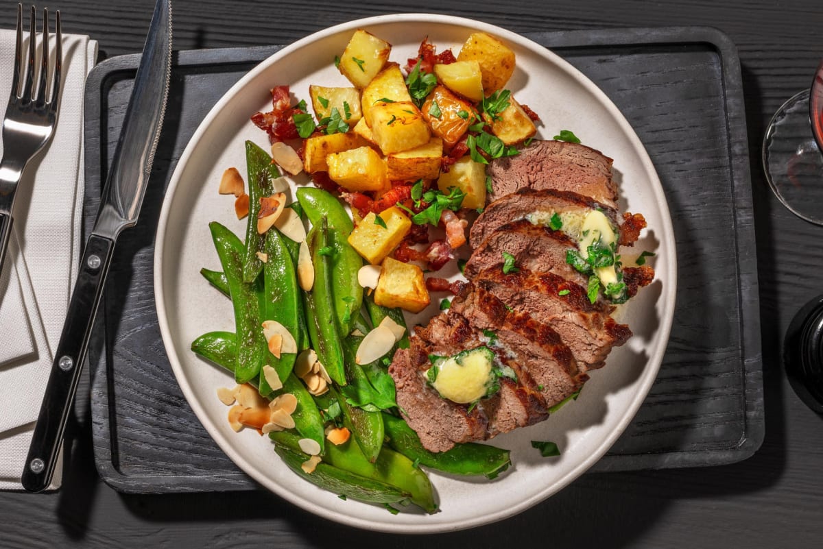 Steak saisi et pommes de terre rôties au bacon