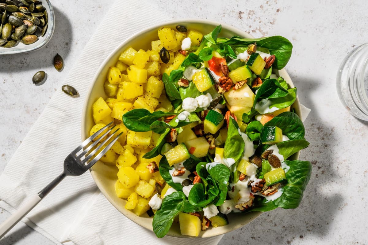 Geitenkaassalade met pecannoten en pompoenpitten