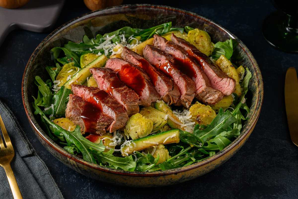 Steak met Parmigiano Reggiano en rucola