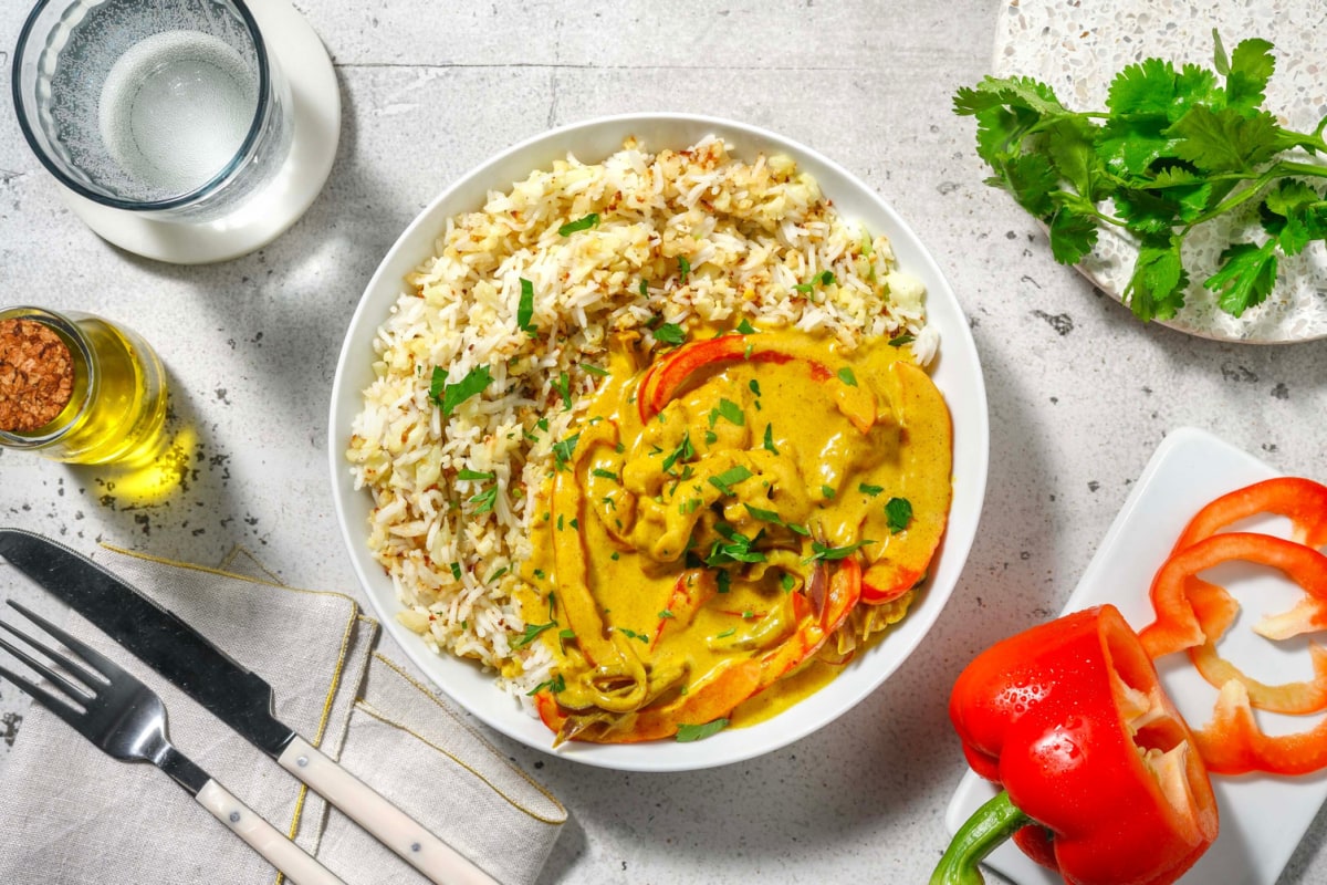 Curry met gekruide kippendijreepjes