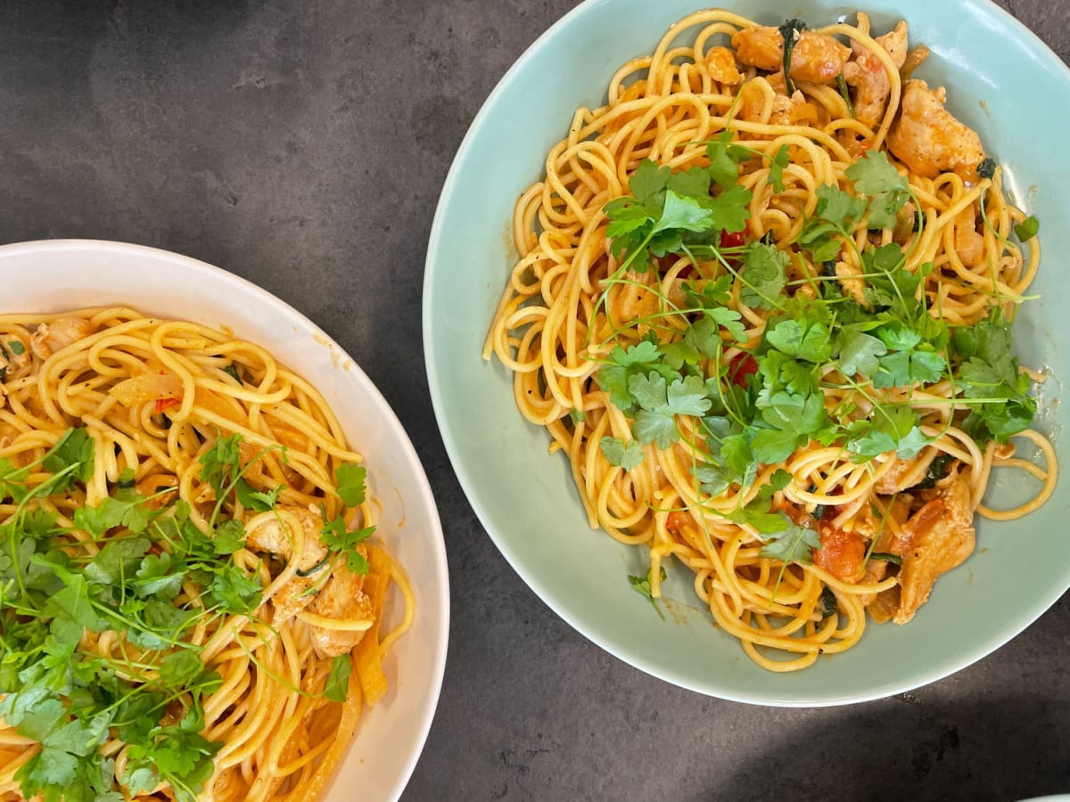 Creamy chicken and paprika pasta with spinach and fresh parsley