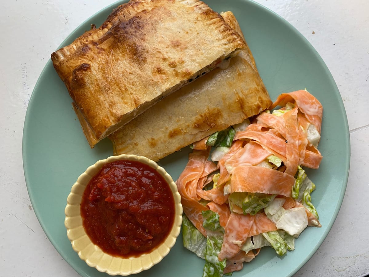 Cheesy caprese calzone