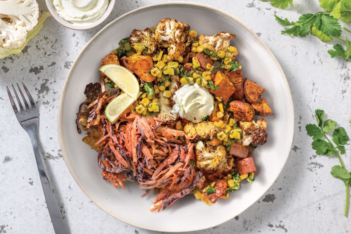 Spiced Cauliflower & Sweet Potato Bowl with Chipotle Slaw & Corn Salsa