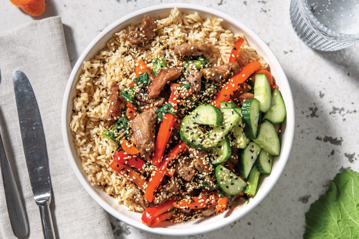 Asian Beef & Brown Rice Bowl with Pickled Cucumber & Sesame Seeds