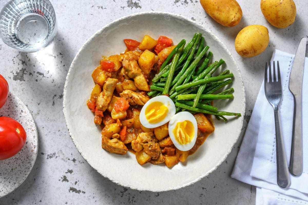 Surinaams gekruide pittige kippendij en aardappel