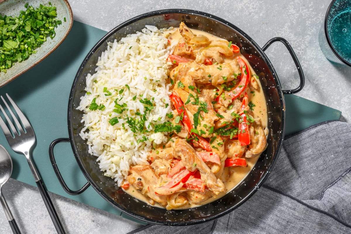 Curry met gekruide kippendijreepjes