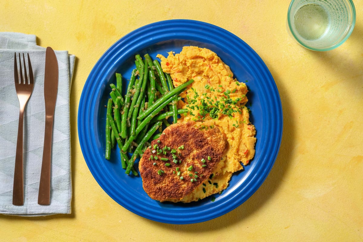 Vegetarische kaasschnitzel met pittige puree van zoete aardappel