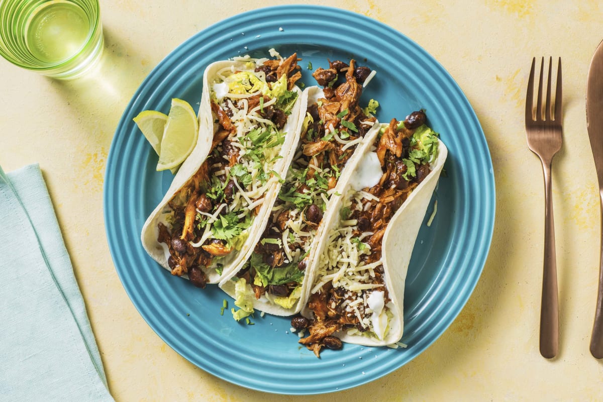 Cheesy Pulled Chicken & Black Bean Tacos
