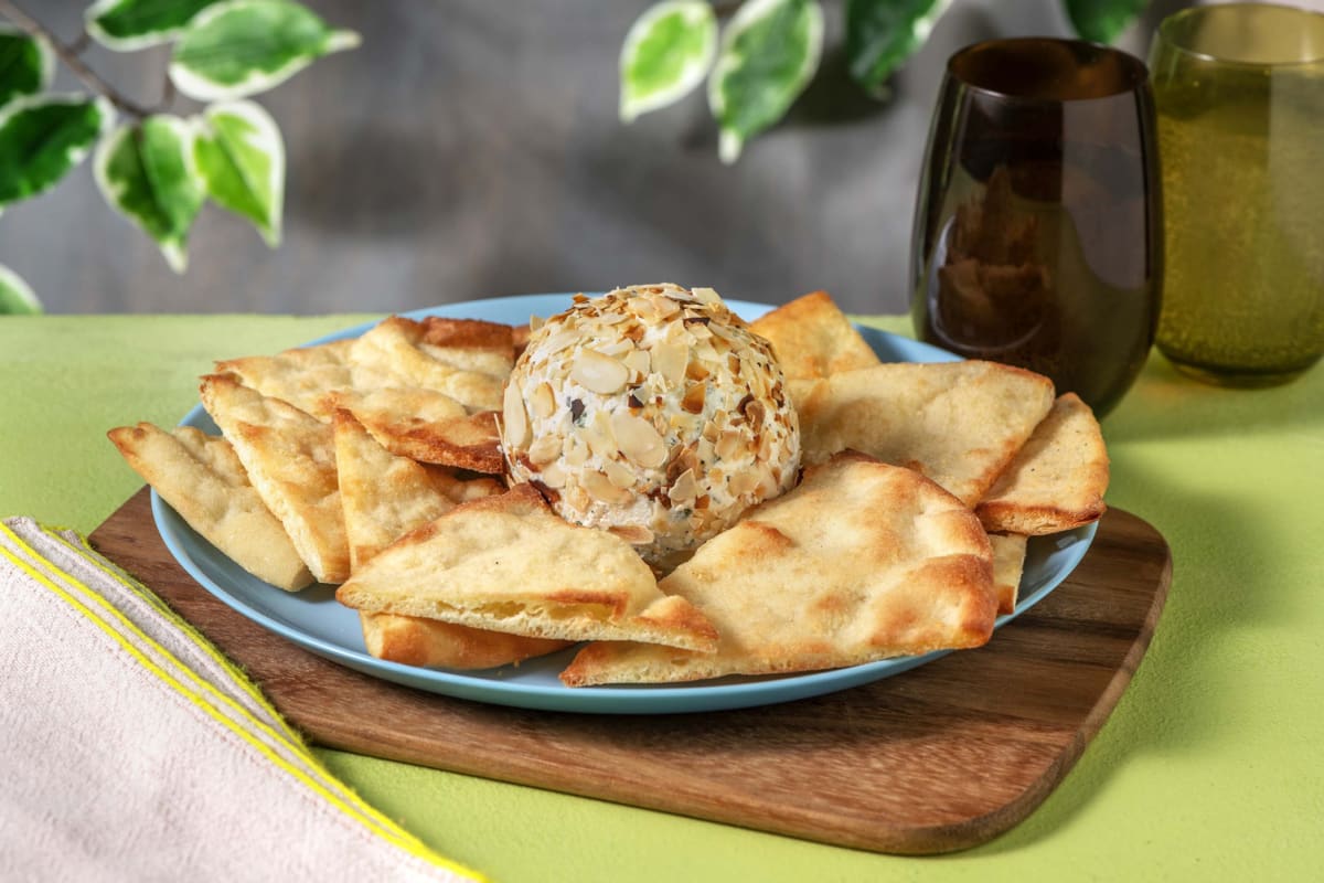 Boule de fromage en croûte de noix et d’herbes savoureuses