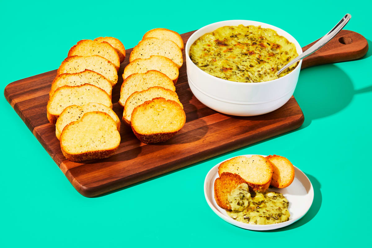 Spinach Artichoke Dip with Toasted Baguettes