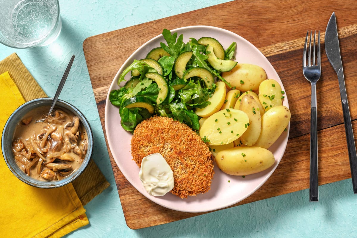 Vegetarische schnitzel met champignonroomsaus