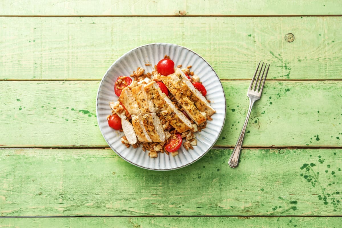 Pan Seared Chicken with Herbs De Provence Over a Warm Farro Mozzarella and Tomato Jumble