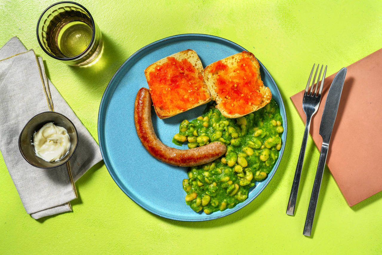 Butifarra a la plancha con judías aderezadas con salsa verde casera, pan con tomate y alioli