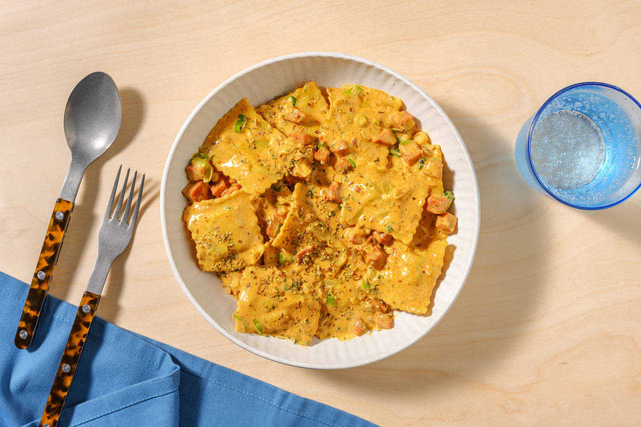 Raviolis de setas con chorizo en salsa cajún cremosa