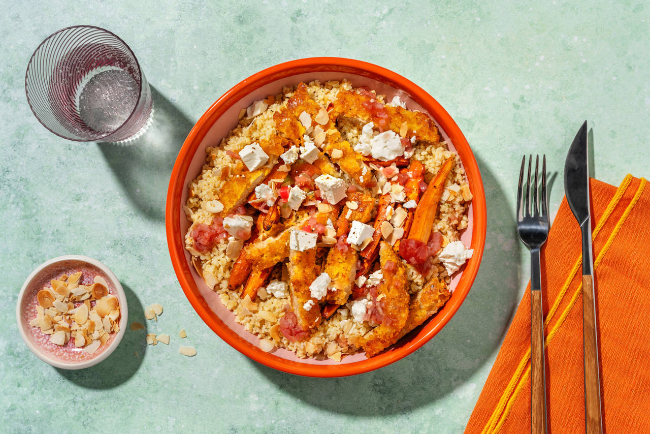 Bol de pollo crujiente vegano y queso griego con zanahoria asada, queso griego y bulgur