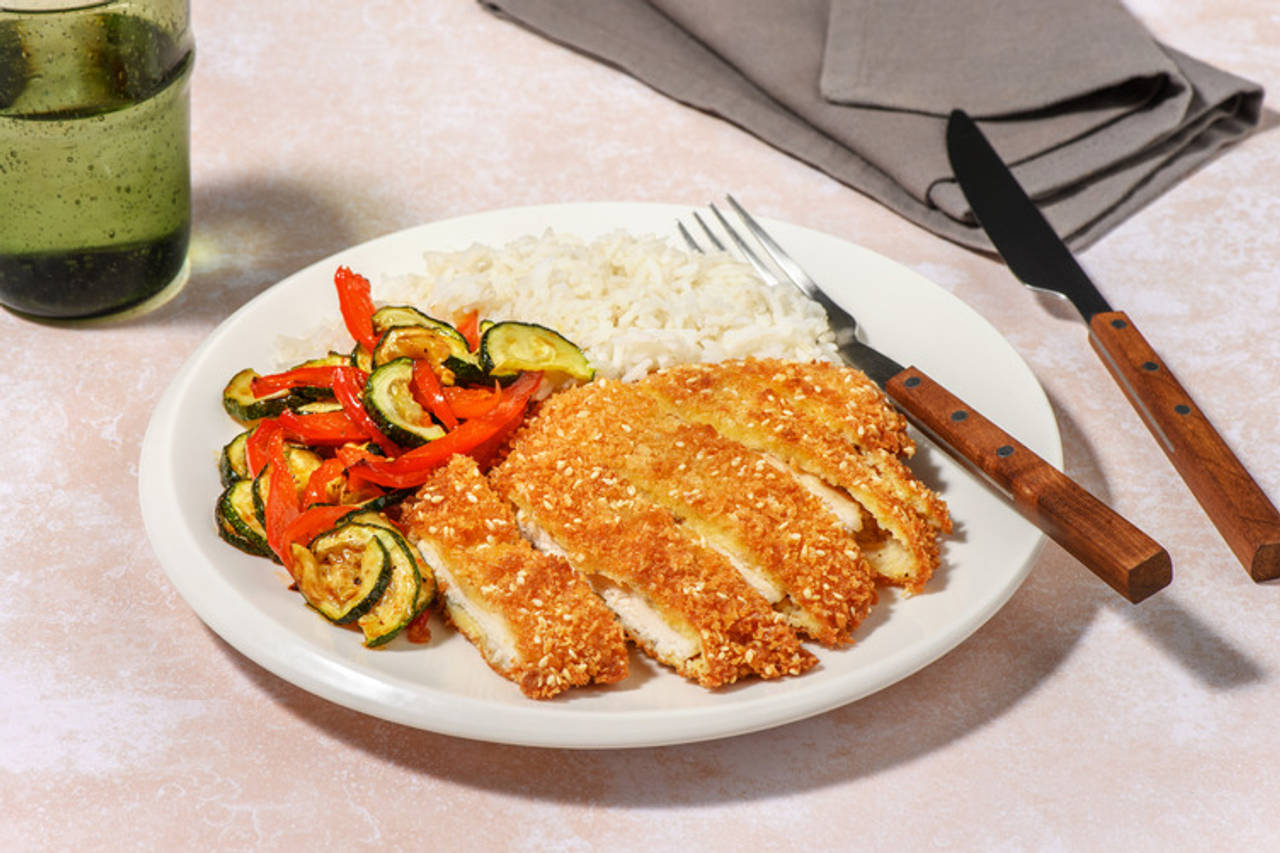 Extra de pollo con costra de sésamo y verduritas a la miel con un toque de sriracha y arroz basmati