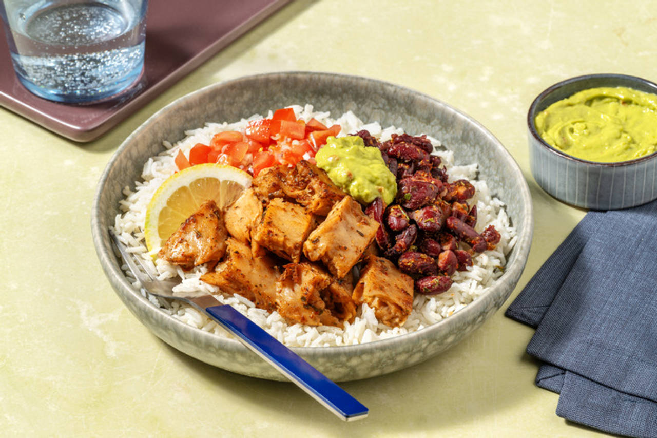 Bol mexicano de heura con guacamole con pico de gallo, judías negras y arroz