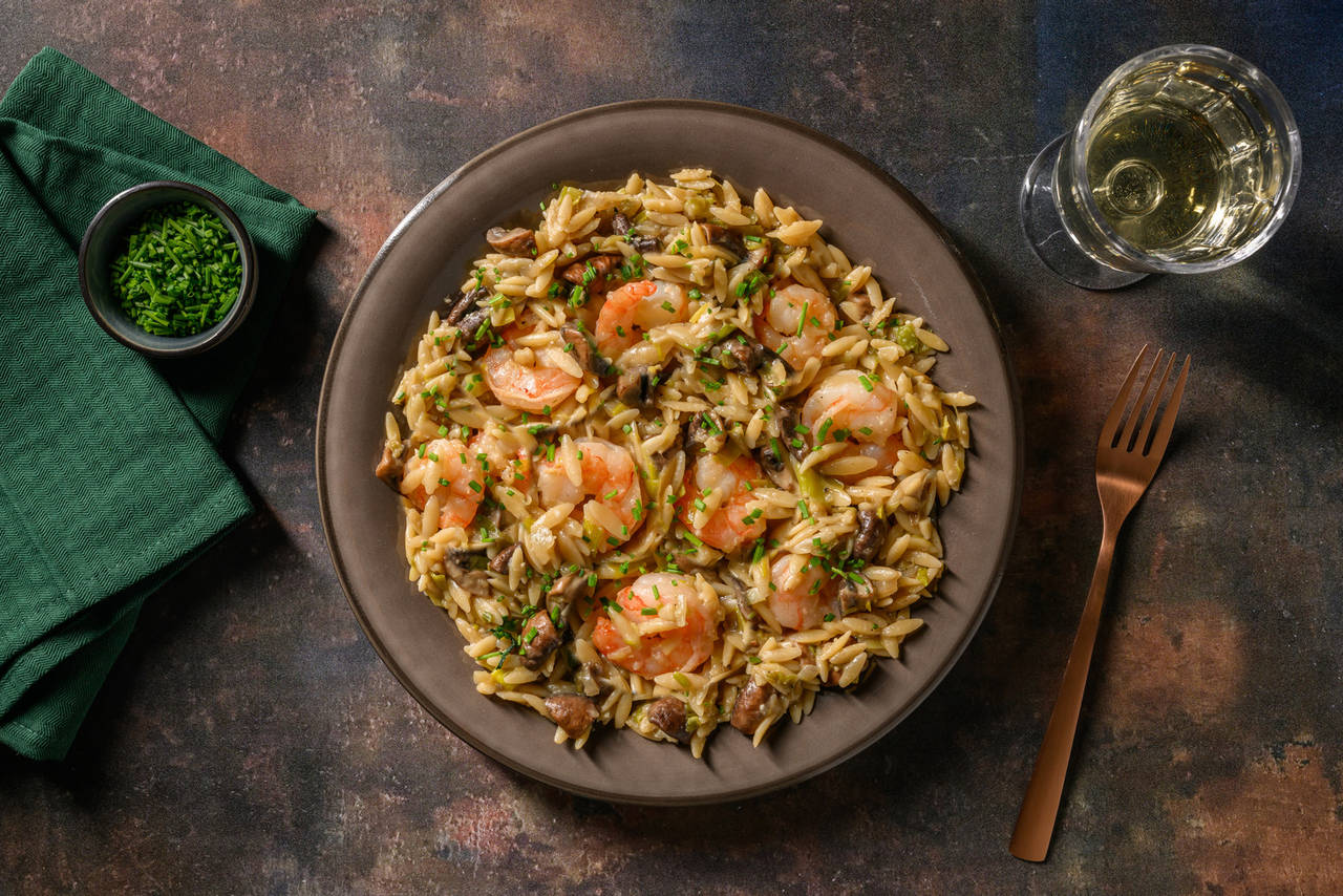 Risotto de orzo con gambones con setas portobello y queso pecorino