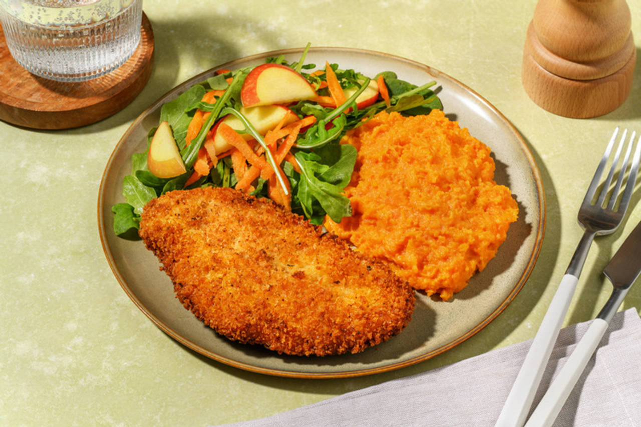 Pollo al estilo de Luisiana: crujiente con especias cajún con puré de boniato y ensalada de manzana