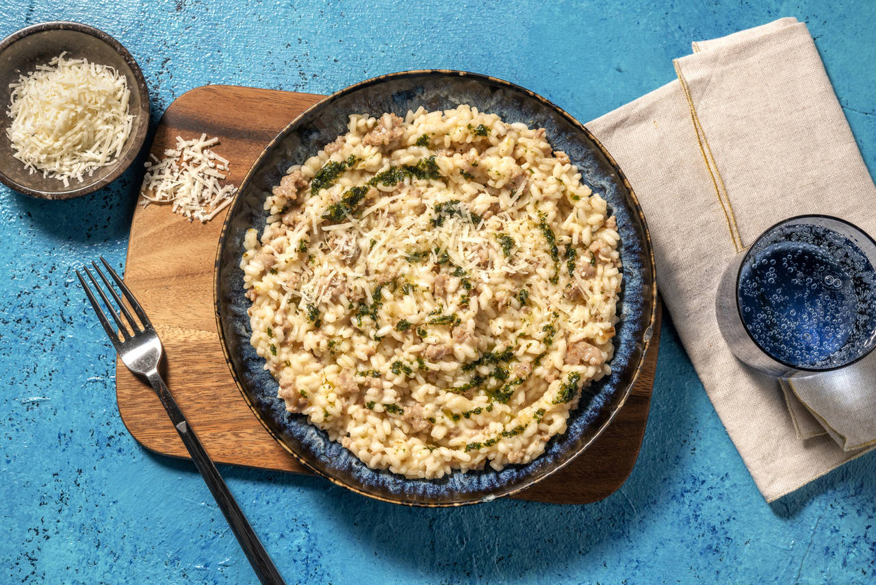 Risotto cremoso con butifarra con aceite de albahaca y queso pecorino