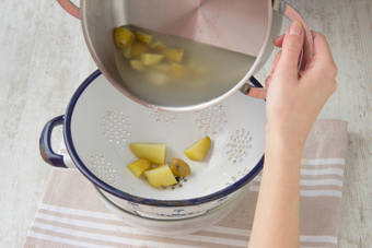 Boil and drain the potatoes