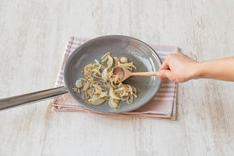 Cook garlic and onion