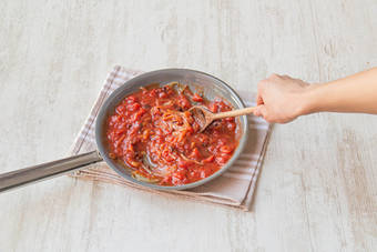 Add the tomatoes and olives