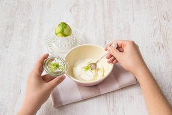 Squeeze lime juice into crème fraîche