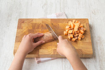 Chop sweet potato into cubes