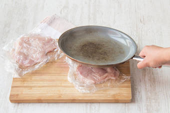 Flatten chicken breasts