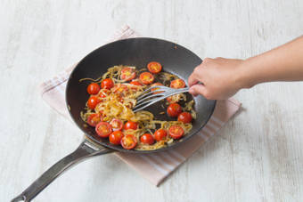 cook tomatoes together with the onion