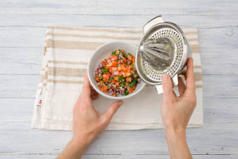 Add the lemon juice to the small bowl