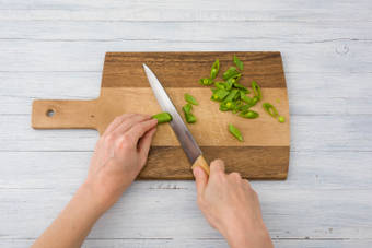 Cut the sugar snap peas into strips