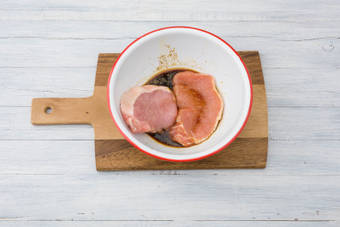 Marinate the pork loin steaks