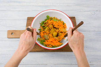 Add the potatoes to the salad bowl