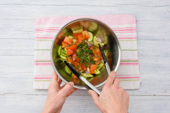 Combine the salad ingredients and toss to coat well