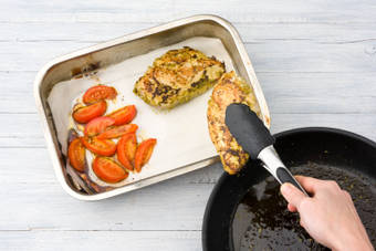 Bake the chicken & tomatoes