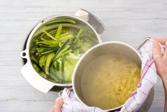 Drain the pasta over the zucchini