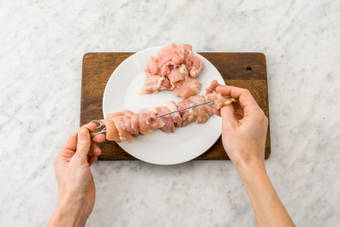 Skewer the chicken