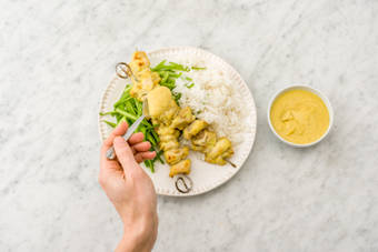 Spoon over the satay sauce