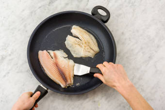 Cook the fish on both sides