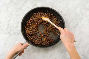 Add the spices and black beans