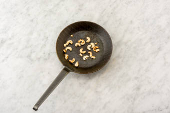 Toast the cashews